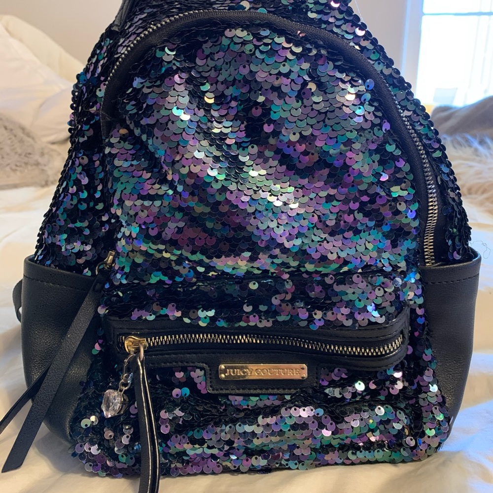 Sequined Juicy Couture backpack with charm.
